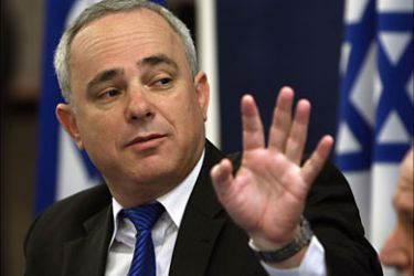 r_Israel's Finance Minister Yuval Steinitz gestures during a news conference in Jerusalem February 23, 2010. Israel's Finance Ministry said on Tuesday it plans to enact new regulations in the