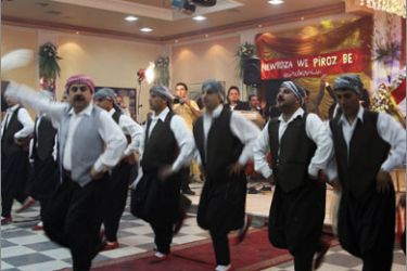 Syrian Kurdish dance group perform during the Nowruz celebrations held by Kurdish groups in a restaurant, near Damascus March 20, 2010. Eid Norouz is an important day especially for Kurds, when the coming of spring is celebrated. REUTERS