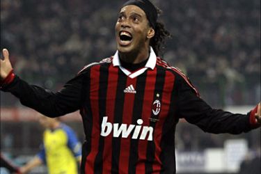 r_AC Milan's Ronaldinho reacts against Chievo during the Italian serie A soccer match at the San Siro stadium in Milan March 14, 2010. REUTERS/Alessandro Garofalo (ITALY