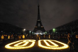 F/The Eiffel tower is submerged into darkness at 8:30 pm (local time) on March 27, 2010, in Paris as part of the Earth Hour switch-off, which comes just months after disappointing UN climate talks in Copenhagen.