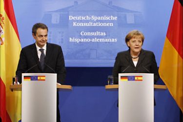 r_German Chancellor Angela Merkel and Spain's Prime Minister Jose Luis Rodriguez Zapatero (L) address a news conference following German-Spanish consultations in Hanover March