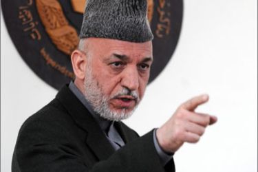 Afghan President Hamid Karzai speaks at the Independent Electoral Commission (IEC) compound in Kabul on April 1, 2010