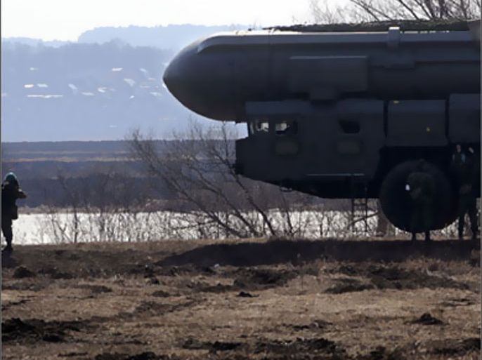 Russian soldier guards a model of Topol intercontinental ballistic missile during a training session at the Serpukhov's military missile forces research institute some 100km outside Moscow on April 6, 2010. The US-Russia nuclear arms treaty to be signed this week enhances trust between the Cold War foes