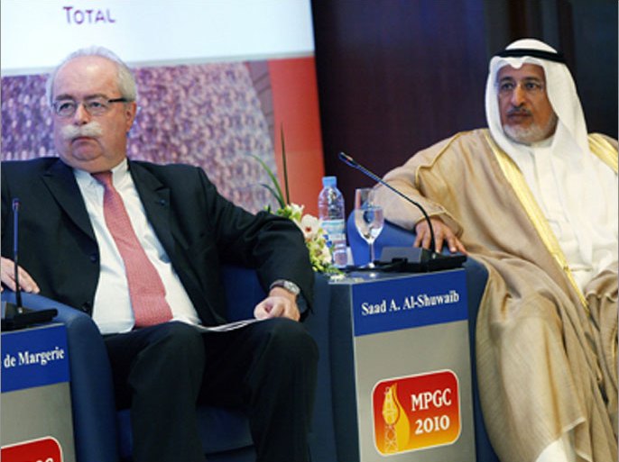 Christophe de Margerie (L), chief executive officer of TOTAL, and Saad al-Shuwaib (R), chief executive officer of Kuwait Petroleum Corporation, attend the Middle East Petroleum
