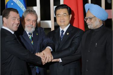 L-R) Russia's President Dmitri Medvedev, Brazilian President Luiz Inacio Lula da Silva, China's President Hu Jintao and India's Prime Minister Manmohan Singh pose for the family photo of the II BRIC Summit at Itamaraty Palace in Brasilia, on April 15, 2010. The BRIC nations -- Brazil, Russia, India and China -- together account for 40 percent of the world's population, 16