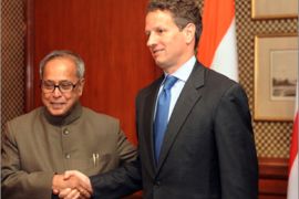 US Treasury Secretary Timothy Geithner (R) shakes hands with Indian Finance Minister Pranab Mukherjee during a meeting in New Delhi on April 6, 2010. Geithner is in India for talks aimed at beefing up an economic relationship that is often overshadowed by Washington's
