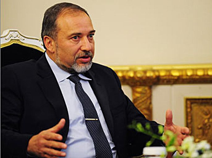 Israeli Foreign Minister Avigdor Lieberman gestures during a meeting with Romanian President Traian Basescu (not pictured) at the Cotroceni Palace, The Romanian Presidency headquarters, on April 14, 2009 in