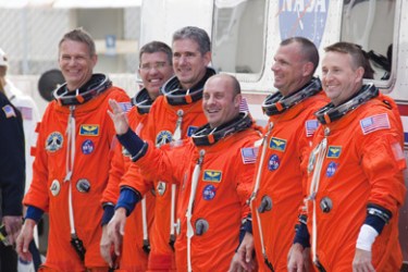 MAY 14: Space Shuttle Atlantis Commander Ken Ham (R-L), Pilot Tony Antonelli, Mission Specialists Garrett Reisman, Michael Good, Steve Bowen and Piers Sellers walk out of NASA's operations and checkout building and into the astronaut van at Kennedy Space Center May 14, 2010 in Cape Canaveral in preparation for their launch later today.