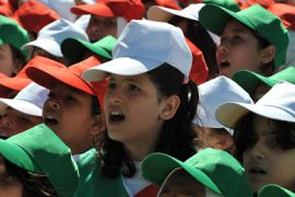 Algerian children sing during the 65th anniversary of the Setif massacre in Setif, eastern Algeria on May 8, 2010.The initial outbreak occurred on the morning of May 8, 1945,