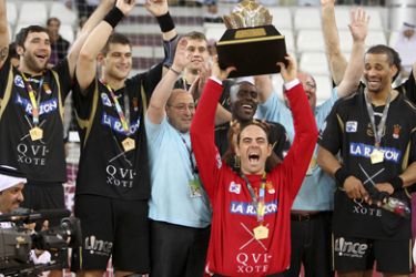 Spain's Ciudad Real players celebrate after winning the Super Globe 2010 handball tournament in Doha