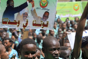 Students rally calling for support for unity between south and north Sudan at the National Assembly in Khartoum July 13, 2010. The placard reads, "Our power if we unite."