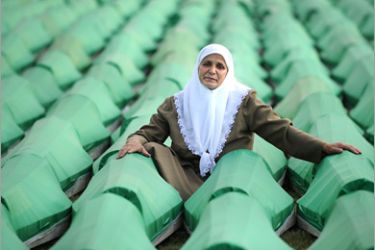 AFP - A Bosnian woman mourns over coffins of a newly identified victim of the 1995 Srebrenica massacre during preparation for mass burial at the Potocari memorial cemetery near