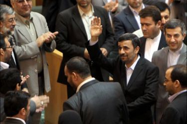 afp : Iranian President Mahmoud Ahmadinejad waves after he addressed expatriate Iranians in a televised speech, in which he said he was ready for face-to-face talks with his US