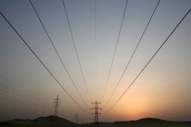 Electirical power lines cross the desert from a power plant south of Cairo as part of the Greater Cairo power grid near Saqqara, Egypt, 27 August 2008. 74 percent of Egypt's electricity comes from natural gas powered plants, 14 percent from petroleum and 12 percent from hydroelectric turbines of the Aswan high dam. EPA/MIKE NELSON