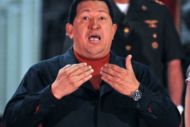 Venezuelan President Hugo Chavez speaks as he waits for current UNASUR Secretary General and former Argentine President, Nestor Kirchner, at the Miraflores presidential palace in Caracas on August 5, 2010. Chavez and Kirchner met to discuss the current diplomatic crisis between Venezuela and Colombia. AFP PHOTO / Miguel Gutierrez