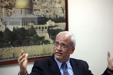 epa02297528 Saeb Erekat, Senior Palestinian negotiator, addresses the media during a press conference at his office in the West Bank town of Ramallah, on 23 August 2010, about the direct negotiations with Israel, after the US invitations to begin direct peace talks on September 02. Erekat said Israel will cause the failure of the direct peace talks if it renews building in the settlements.