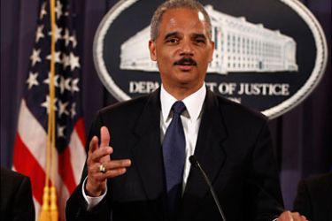 r_U.S. Attorney General Eric Holder (C) announces charges of terrorism violations against 14 people for providing resources to the foreign organization al-Shabaab while at the U.