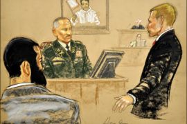 r : Canadian detainee Omar Khadr (L) attends his war crimes tribunal in Guantanamo Bay, Cuba, in this courtroom sketch by courtroom artist Janet Hamlin, and reviewed by a