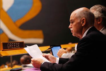 r_Greece's Prime Minister George Papandreou sits during the Millennium Development Goals Summit at the U.N. headquarters in New York, September 20, 2010