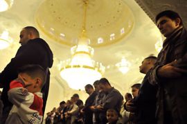 Muslims perform the Eid-ul-fitr salat, or Eid prayer at the Omar mosque in Berlin's Mashari Islamic Centre September 10, 2010. Eid marks the end of Ramadan, the Islamic holy month of fasting, for Muslims around the world. AFP PHOTO / JOHN MACDOUGALL