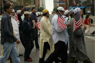 NEW YORK - SEPTEMBER 26: People march in the American Muslim Day Parade on September 26, 2010 in New York, New York. The annual parade celebrates