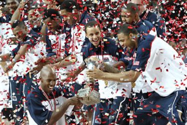177 - Istanbul, -, TURKEY : US players celebrate with the trophy after winning the World Championship basketball final match Turkey vs. USA, on September 12, 2010 in Istanbul.