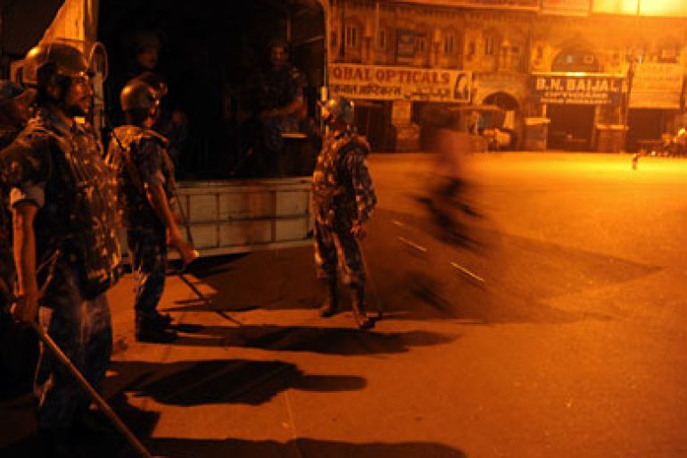 Indian paramilitary soldiers keep watch on a street in Lucknow on September 30, 2010, following a long running dispute over a religious site in Ayodhya. An Indian court ruled September 30 that a disputed holy site in Ayodhya with a history of triggering Hindu-Muslim clashes should be divided - a judgement seen as favouring the Hindu litigants. In 1992 the demolition of a 16th-century mosque on the Ayodhya site by Hindu activists sparked riots that killed more than