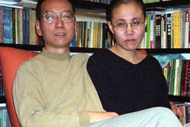 This file photo taken on October 22, 2002 shows Chinese dissident Liu Xiaobo (L) and his wife Liu Xia posing for a photograph in Beijing. Jailed Chinese pro-democracry activist Liu Xiaobo won the 2010 Nobel Peace Prize on October 8, 2010, the Norwegian Nobel Committe said. CHINA OUT AFP