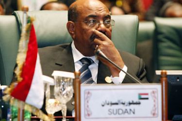 Sudanese President Omar al-Bashir attends the opening session of the second Afro-Arab Summit