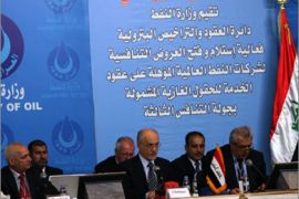 Oil Minister Hussein al-Shahristani (2nd L) speaks during the third bidding round for gas fields at the Oil Ministry in Baghdad October 20, 2010.