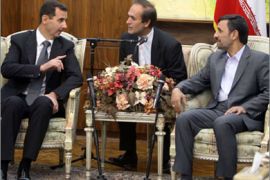 Iranian President Mahmoud Ahmadinejad (R) holds talks with his Syrian counterpart Bashar al-Assad (L), during their meeting in Tehran on October 02, 2010