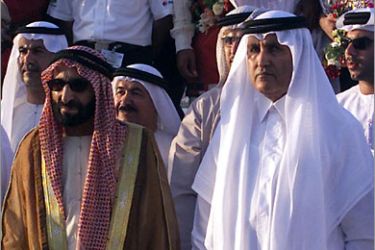 FILES)--A picture taken 04 April 2003 shows Sheikh Saqr bin Mohammed al-Qassimi (L), ruler of Ras al-Khaimah, part of the United Arab Emirates (UAE), and