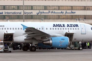 An Airbus A319 plane operated by France's Aigle Azur is seen docked on the tarmac at Baghdad's International Airport on October 31, 2010, becoming the first flight from a European airline to arrive in the city since a 1990 international embargo on Iraq.
