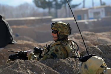 (FILES) In this photograph taken on January 20, 2010, an Australian soldier of Omlet-c company takes position during a NATO/ISAF joint task force patrol in Mirwais in the southern province of Uruzgan.