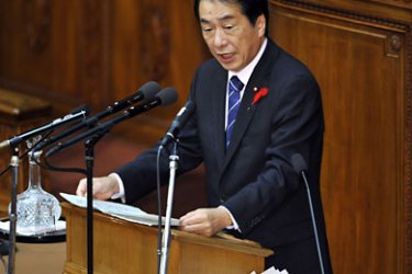 Japanese Prime Minister Naoto Kan delivers his policy speech at the Lower House's plenary session at the National Diet in Tokyo on October 1, 2010. Kan urged China to act as a "responsible member of the international community