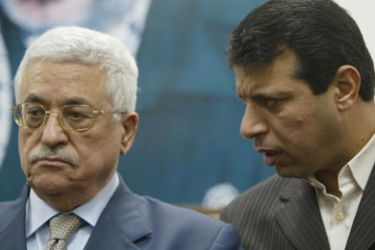 Palestinian President Mahmud Abbas (L) and Mohammed Dahlan (R) during a press conference in Gaza City, late Thursday, 15 February 2007.