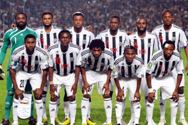 Democratic Republic of Congo's Tout-Puissant Mazembe players pose before their Confederation of African Football (CAF) Champions League match against Tunisia's Esperance de Tunis on November 13, 2010 in Rades Olympic stadium in Tunis. TP Mazembe of DR Congo successfully defended their CAF Champions League title on Saturday with a 6-1 aggregate victory at the expense of Esperance after their second leg