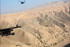 r_U.S. helicopter flies near the new found gold mine site in Nor Aaba in Takhar province, November 26, 2010. The hills around dusty Nor Aaba are laced with gold but villagers have blocked