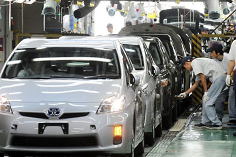epa02467485 (FILE) A file photo dated 05 June 2009 shows Japanese autoworkers inspecting Toyota Motor Corp.'s third-generation hybrid 'Prius' cars coming off the assembly line at the automaker's Tsutsumi plant in Toyota city, Aichi province, Japan.