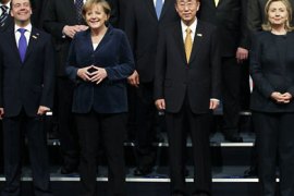 Russia's President Dmitry Medvedev (L-R), German Chancellor Angela Merkel, U.N. Secretary General Ban Ki-moon and U.S. Secretary of State Hillary Clinton pose for a family photo during the Organisation for Security and Cooperation in Europe (OSCE) Summit in Astana December 1, 2010.