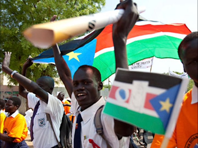 R_Southern Sudanese citizens march in the streets in support of the independence referendum in Juba, South Sudan, December 9, 2010. The referendum on whether the