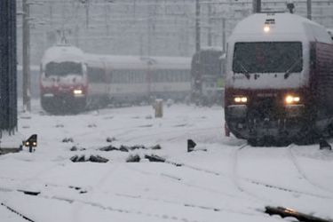 SWITZERLAND : Trains remain at a standstill during snowfall in Bern on December 1, 2010. Heavy snowfalls forced some of Europe's busiest airports to close and wreaked havoc on roads and railways as an unseasonable cold snap swept the continent, claiming a dozen lives.