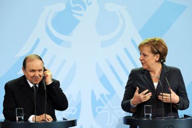 epa02485711 German Chancellor Angela Merkel and Algerian President Abdelaziz Bouteflika hold a joint press conference after a meeting at the Chancellery in Berlin, Germany, 08 December 2010. EPA/Rainer Jensen