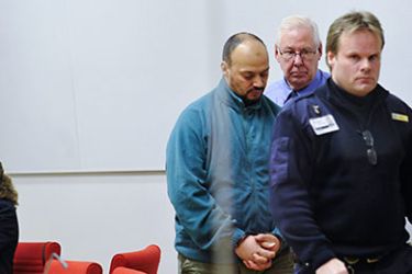 Sahbi Zalouti, a 37-year-old Swede of Tunisian origin, walks with his defense attorney Elisabeth Audell (L) and two court officers during a court hearing in Attunda Tingsratt in Stockholm on December 30, 2010. A Swedish court decided today to remand in custody a fourth suspect in a plot to kill staff at a Danish newspaper after three others were earlier