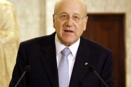 epa02548390 A handout picture released by Dalati & Nohra shows new Lebanese Prime Minister Najib Mikati speaking to reporters after his meeting with Lebanese President Michel Suleiman (not pictured) at the presidential palace, Beirut, Lebanon, 25 January 2011.