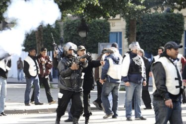 Police fire teargas shells to disperse demonstrators in the center of Tunis on January 17, 2011. Tunisian protesters called for the abolition of ousted president Zine El Abidine Ben Ali's ruling party amid a chaotic power vacuum as politicians prepared a government of national unity.
