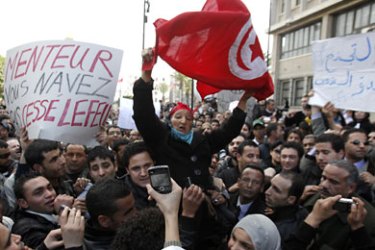 epa02528902 Protesters show a banner saying 'Liar, you didn' t cease fire' during a protest against Tunisian President Zine El Abidine Ben Ali , in Tunis, Tunisia, 14 January 2011, after Tunisian President Zine El Abidine Ben Ali's address to the nation. According to media reports, Tunisia President Ben Ali said, in his 13 January