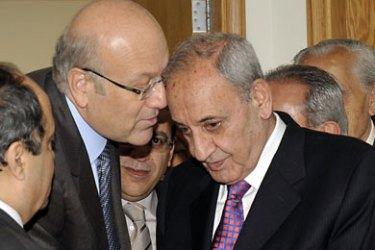 Lebanon's Prime Minister-designate Najib Mikati (L) talks with Lebanese parliament speaker Nabih Berri (R) after their meeting at the Lebanese Parliament during consultations to form a new cabinet, in Beirut, on 27 January 2011. AFP PHOTO