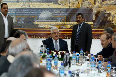 Palestinian President Mahmoud Abbas (C) attends a Palestinian Liberation Organization (PLO) executive committee and a Fatah Central Committee meeting in the West Bank city of Ramallah February 18, 2011.