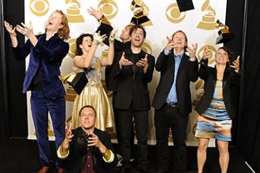 epa Canadian indie band Arcade Fire celebrate by tossing up their awards for Album of the Year in the Photo Room at the 53rd Annual GRAMMY Awards at Staples Center in Los Angeles, California, USA, 13 February 2011.